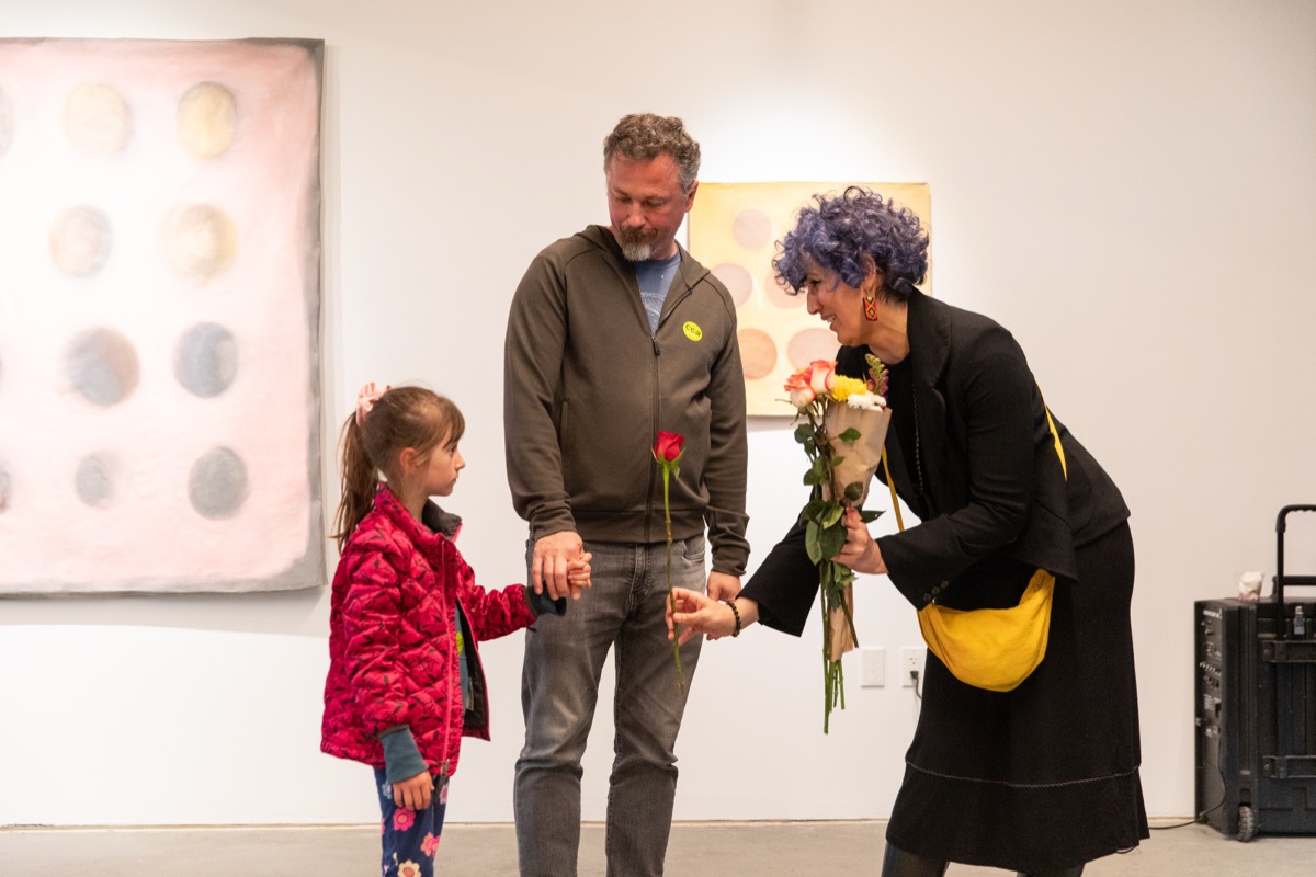 Guests view MFA thesis work at the opening